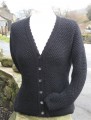 Ladies hand-framed Smarber cardigan in black Wensleydale wool.