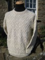 Hand-knitted sweater in natural Swaledale wool.